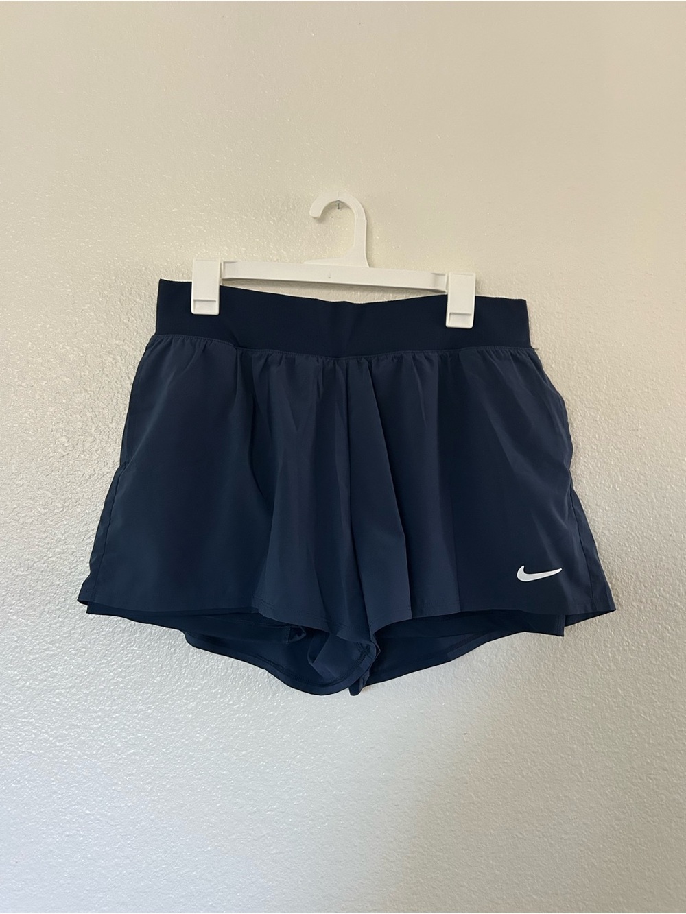 Nike Women’s Navy Blue Athletic Shorts with White Swoosh